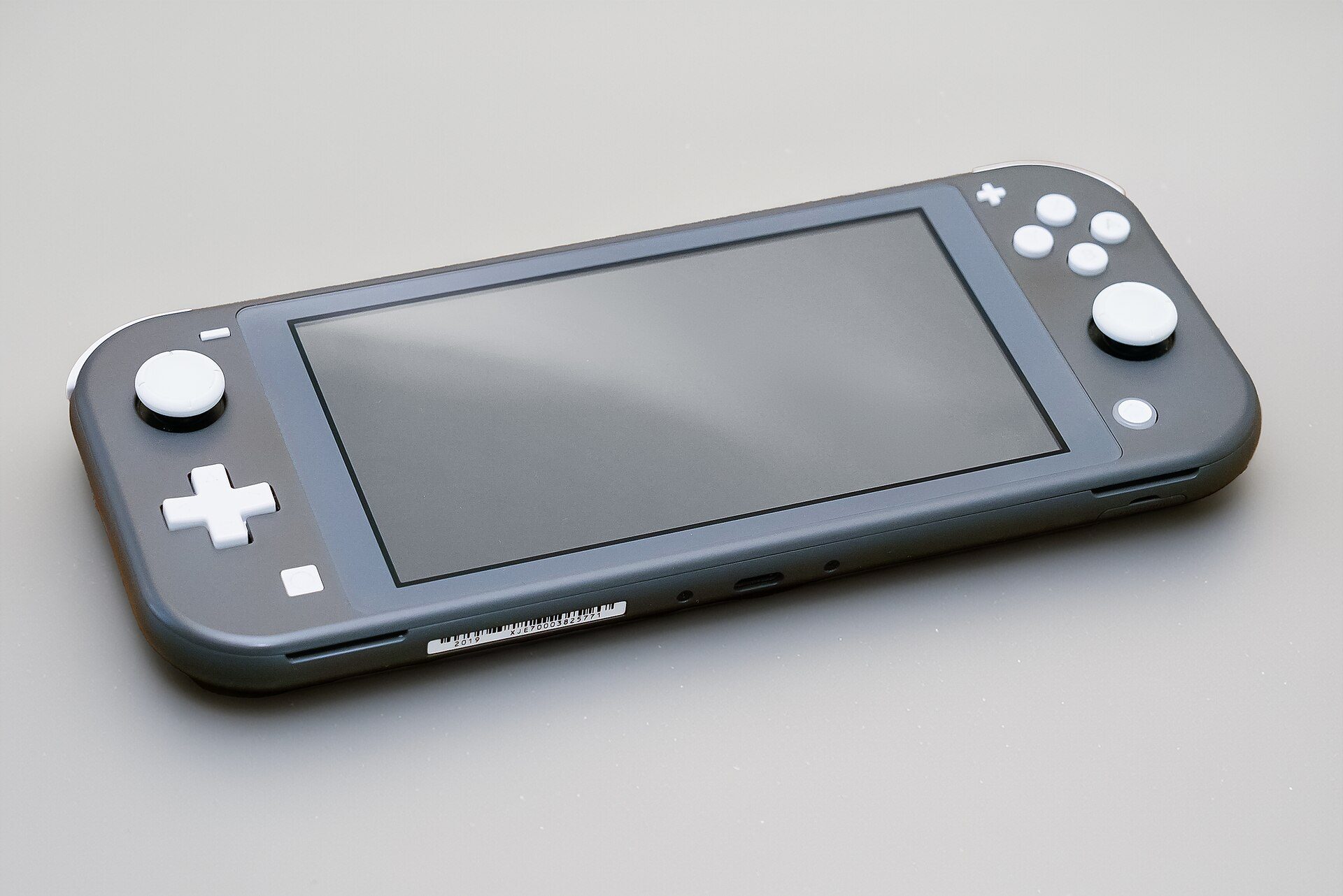 Nintendo Switch Lite gris sobre una mesa